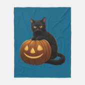 Schattigee zwarte kat op een pompoen fleece deken (Voorkant)