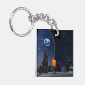 Schattigee zwarte kat staren naar een kaars sleutelhanger (Voorkant Links)