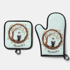 Schattigee zwarte kitten die naar een ster kijkt ovenwant & pannenlap set