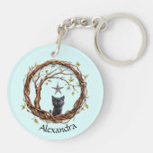 Schattigee zwarte kitten die naar een ster kijkt sleutelhanger (Achterkant)