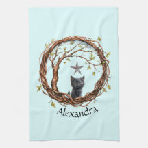 Schattigee zwarte kitten die naar een ster kijkt