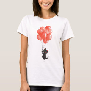 Schattigee zwarte kitten houdt een stel rode ballo t-shirt