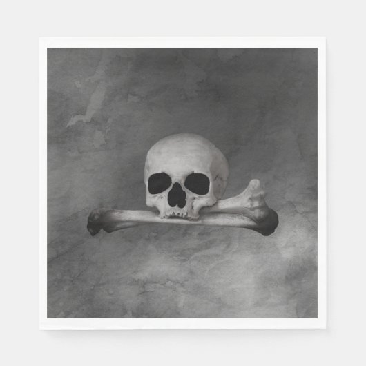 schedel en kruisbeenderen op grijze textuur servet (Voorkant)