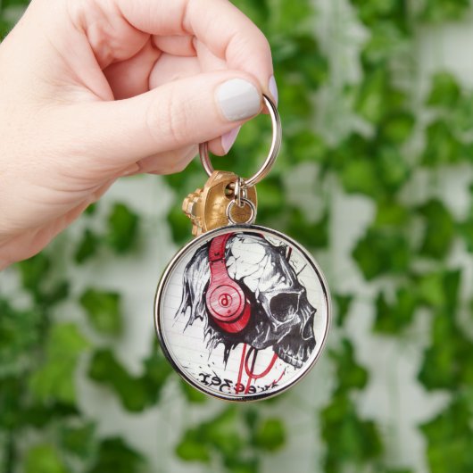 Schedel met hoofdtelefoon ontwerp sleutelhanger (Hand)