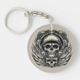 Schedelontwerp met vleugels en symbolen sleutelhanger