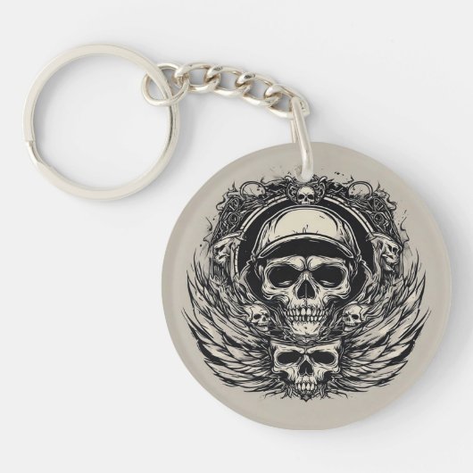 Schedelontwerp met vleugels en symbolen sleutelhanger (Voorkant)