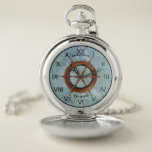 Scheepshelm Nautical Pocket Horloge blauw<br><div class="desc">Nautisch zakhorloge dat kan worden gepersonaliseerd met uw eigen tekst. Alles geformatteerd en klaar voor u om te bewerken in de eenvoudige zazzle-editor. Ontworpen met een scheepsroer afbeelding en zwarte accenten op een abstracte blauw-groene achtergrond. uw keuze uit zilveren of goudkleurig hoesje. Creëer met clip art van Angela Wenke op...</div>