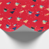 Scheerder in sneeuwvlokken op rood omslagpapier cadeaupapier (Hoek)