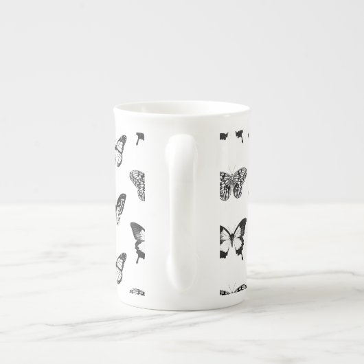 Schets van vlinder, zwart-wit porselein kop (Achterkant)