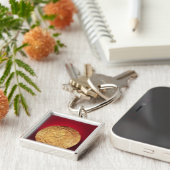 Schijf die mogelijk als broche wordt gebruikt, van sleutelhanger (Zijkant)