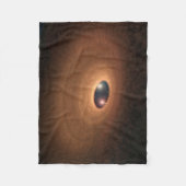 Schijf van stoffig materiaal overgebleven van ster fleece deken (Voorkant)