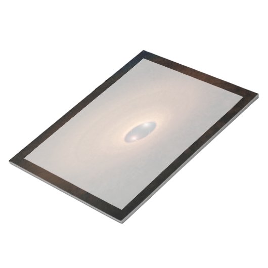 Schijf van stoffig materiaal overgebleven van ster notitieblok (Schuin)