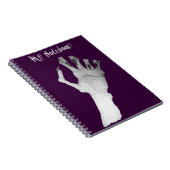 Schijnbaar gruwelijk monster met de hand notitieboek (Rechterzijde)