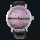 Schilderachtig roze landschap horloge<br><div class="desc">Mooie roze zonsondergang boven een kalm meer met een rij bomen op de achtergrond. Een prachtig mengen en mengen van kleurrijke wolken met roze,  blauwe,  paarse en gele wolken. Geweldige en vochtige verlichting,  schaduwen en reflecties.</div>