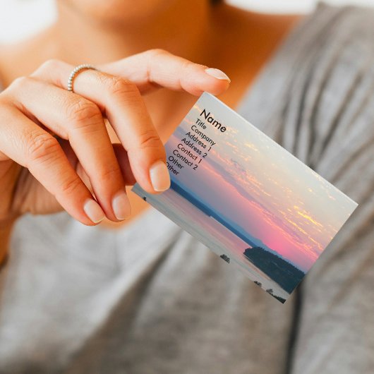 Schilderachtig roze zeegezicht zonsondergang visitekaartje