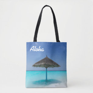 Schilderachtig Tropisch strand met Thatched Umbrel Tote Bag