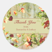 Schilderd hek met lentbloemen ronde sticker (Voorkant)