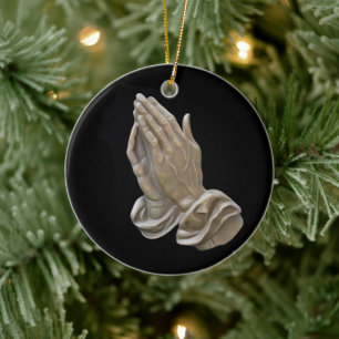 Schilderd metaal dat zich op haar handen drukt keramisch ornament