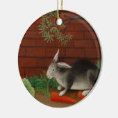 schilderende konijnenetende wortel keramisch ornament (Links)