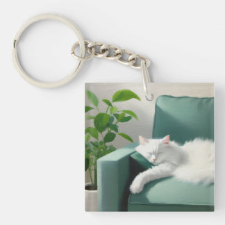 Schilderij van de kat slapen op een groene bank sleutelhanger