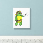 Schildpad als Piraat met gebookte hand- en oogpatc Canvas Afdruk (Insitu (Houten vloer))