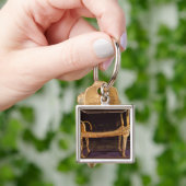 Schimmels in de vorm van de heilige koe sleutelhanger (Hand)