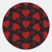 Schitterend rood hartpatroon op zwart ronde sticker (Voorkant)