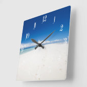 Schitterend witzand strand en turkooizen oceaan vierkante klok (Hoek)