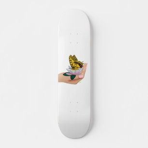Schmetterling van het skateboard in de hand