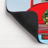 Schnauzer hond in auto met kerstman muismat (Hoek)