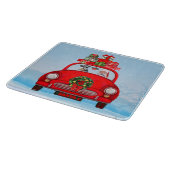 Schnauzer hond in auto met kerstman  snijplank (Hoek)