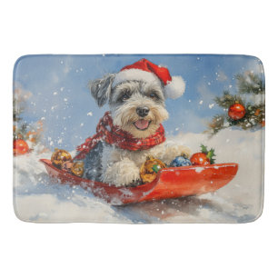 Schnauzer-hond in slee Laat het sneeuwen Kerstmis Badmat