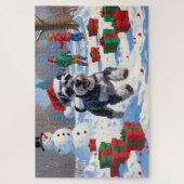 Schnauzer loopt in de sneeuw met kerst Pet Legpuzzel (Verticaal)