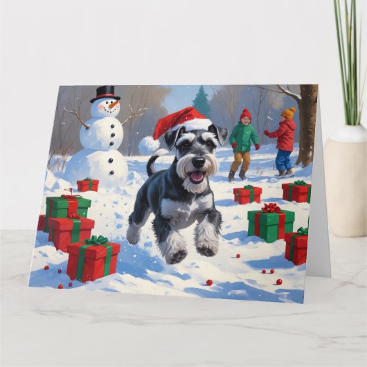 Schnauzer Rent in de Sneeuw met Kerstmuts Kaart (Voorkant)
