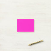 Schokbrekende roze vaste kleur post-it® notes (Op bureau)