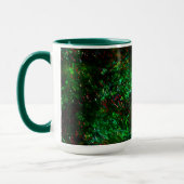 Schommeling van donkere vlekken op de toongroene e mok (Links)