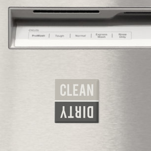 Schone vuile grijze wasmachine en zwarte wasmachin magneet