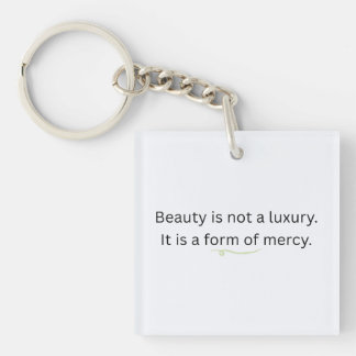 Schoonheid is geen luxe, het is een vorm van genad sleutelhanger