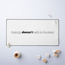 Schoonheid vraagt niet om een bureaumat