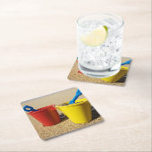 Schoppen en spijkers op zandstrand kartonnen onderzetters (Insitu)