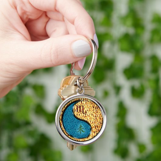 Schorpioen en vuurgeit sleutelhanger (Hand)