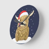 Schotse hooglandkoe in de kerstwinter ronde klok (Hoek)