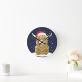 Schotse hooglandkoe in de kerstwinter ronde klok (Huis)
