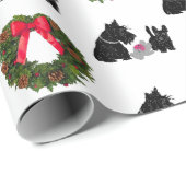 Schotse Terriër Pap en Pup met Kerstmis Cadeaupapier (Rol Hoek)