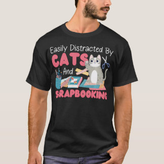 Schrapboekkat gemakkelijk afgeleid door katten en t-shirt