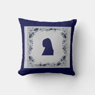 Schroefblauw tegelmeisje met een parel kussen
