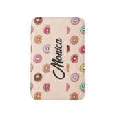 Schuddecoratieve donuts op roze badmat (Voorkant Verticaal)