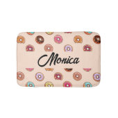 Schuddecoratieve donuts op roze badmat (Voorkant)