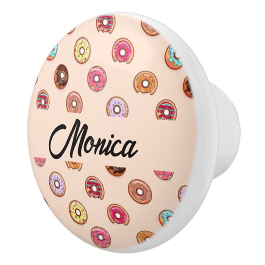 Schuddecoratieve donuts op roze keramische knop (Rechts)