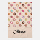 Schuddecoratieve donuts op roze theedoek (Verticaal)